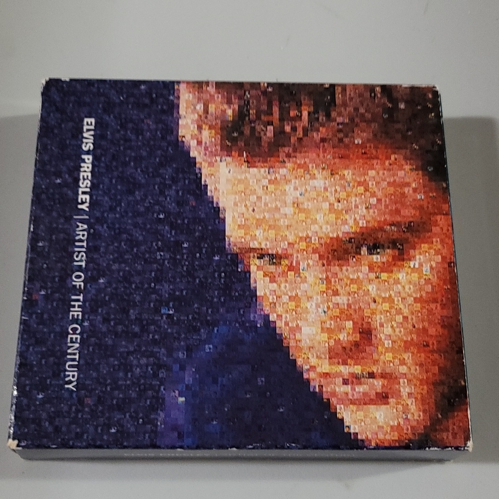 Elvis "ART OF THE CENTURY "collectors set like new condition 3 disc's collectors